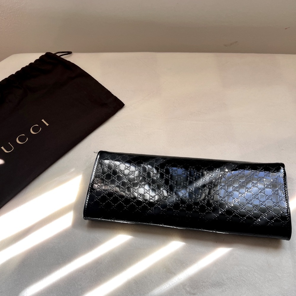 Gucci patent leather monogram clutch